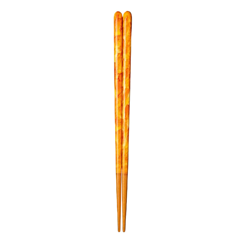 Orange chopsticks with chopstick rest